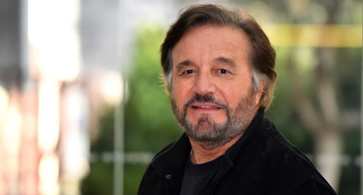 Christian De Sica sorridente