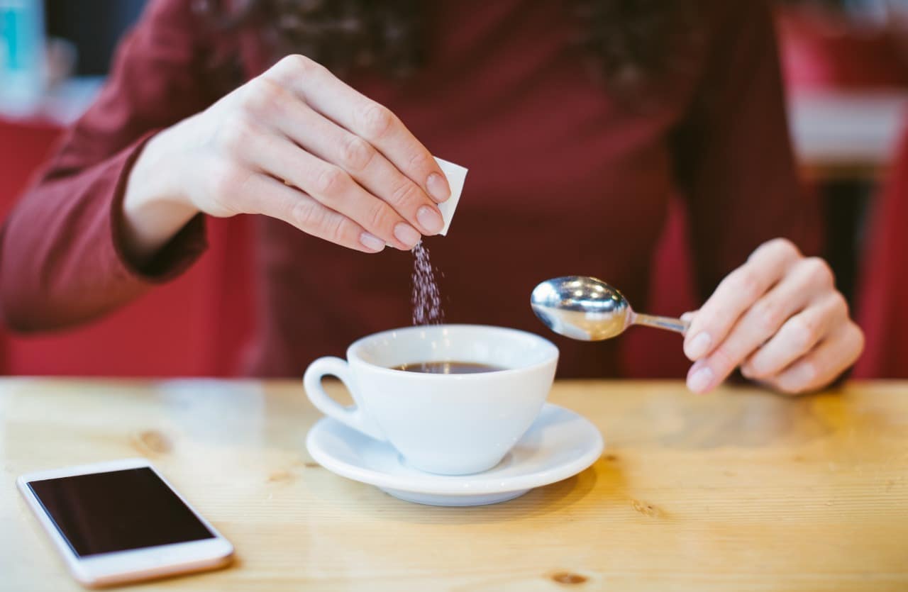 Blood sugar, woman drinks coffee