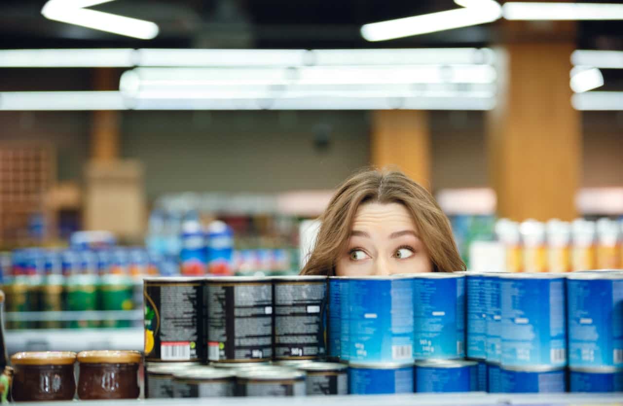 Young man shopping in supermarkets